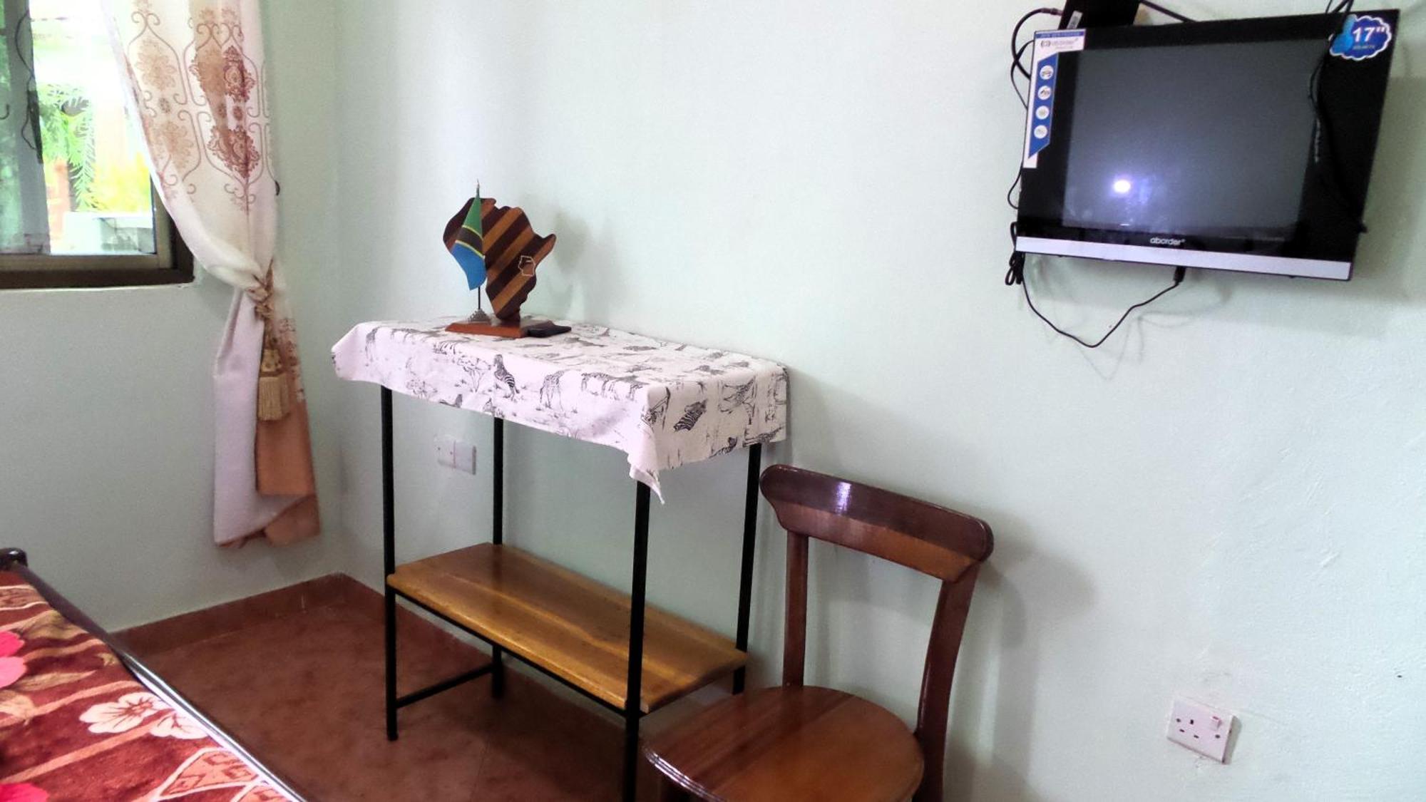 Home Feeling Neneu Lodge Moshi Exterior foto
