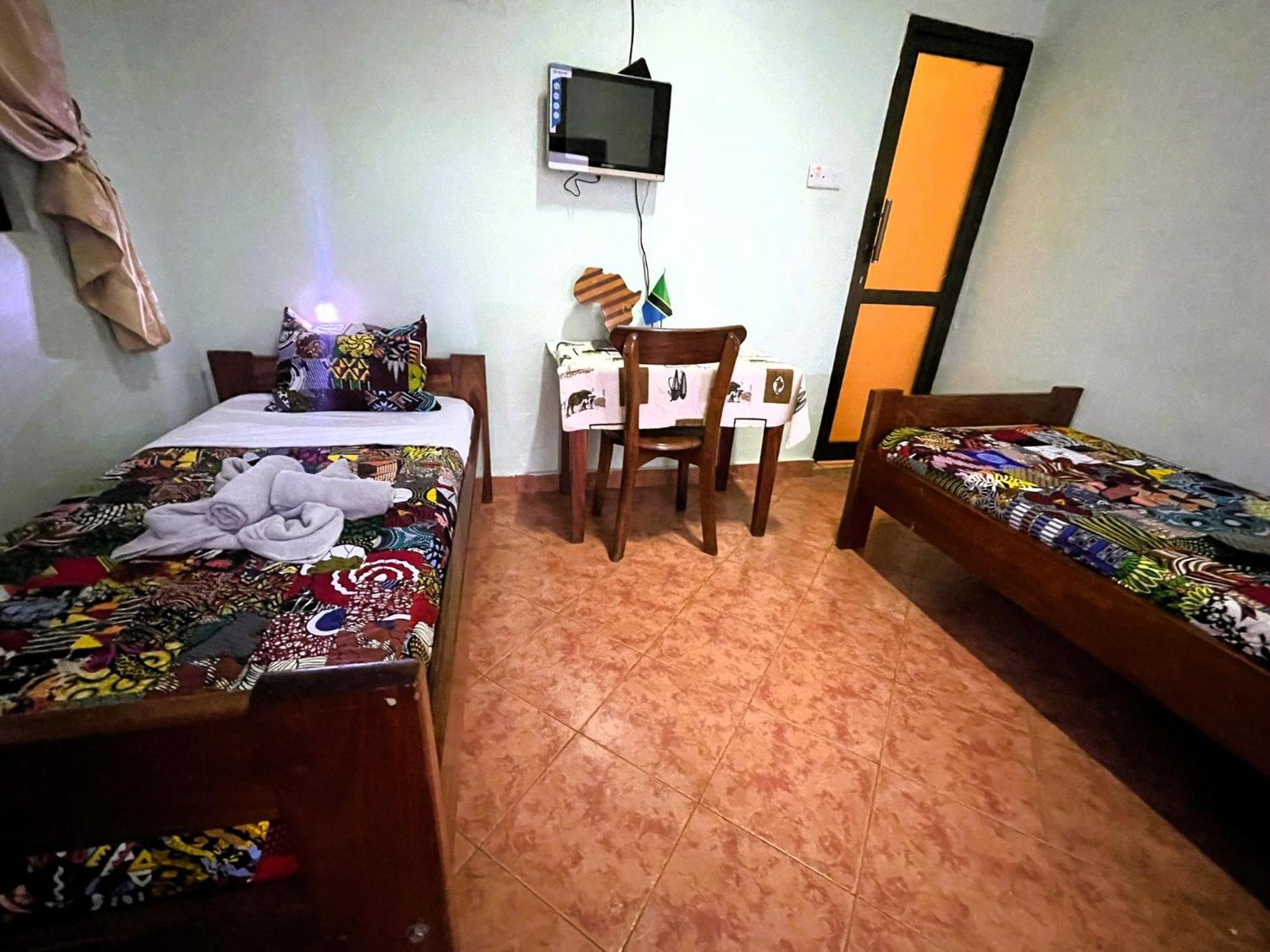 Home Feeling Neneu Lodge Moshi Exterior foto