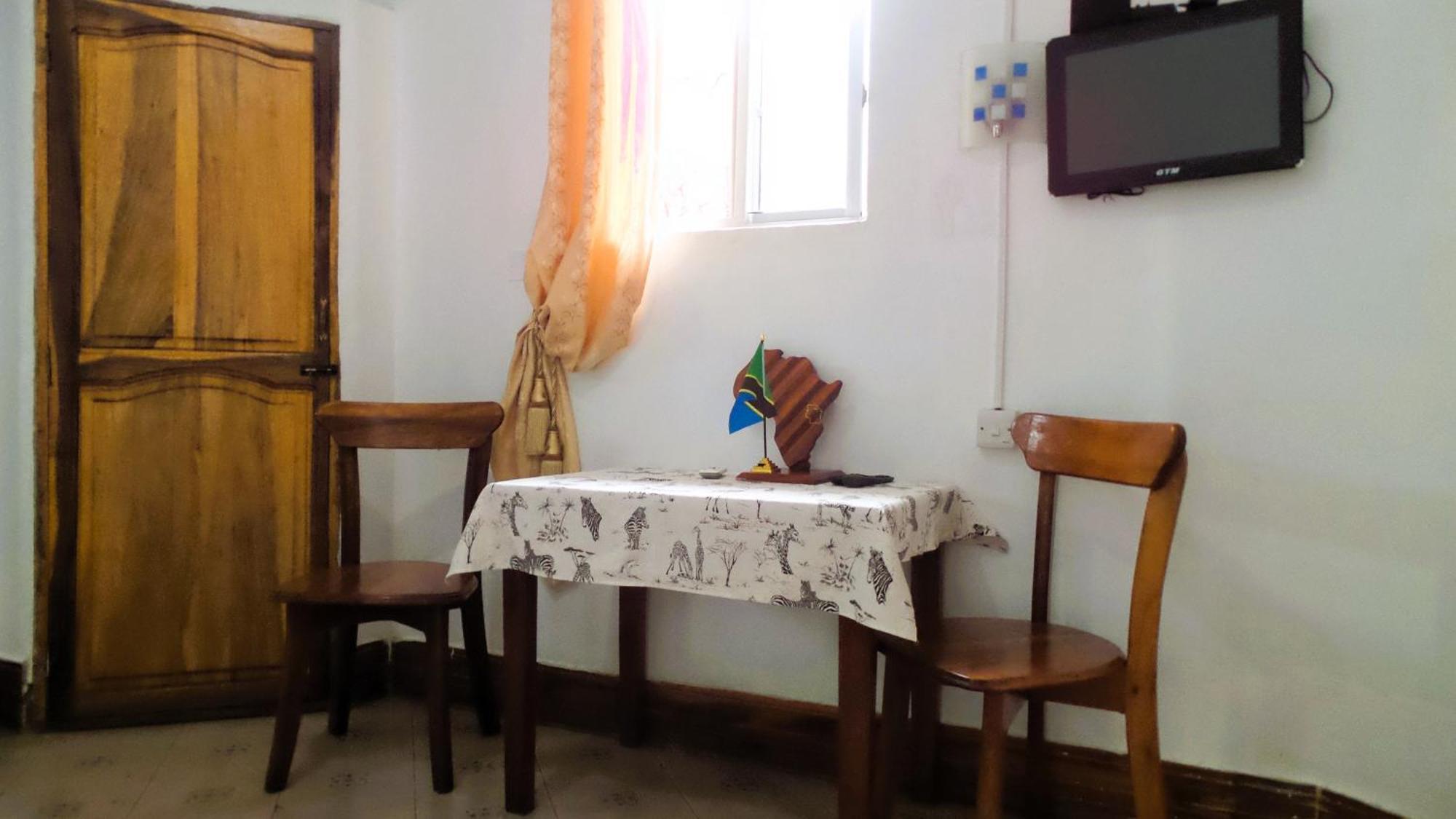 Home Feeling Neneu Lodge Moshi Exterior foto