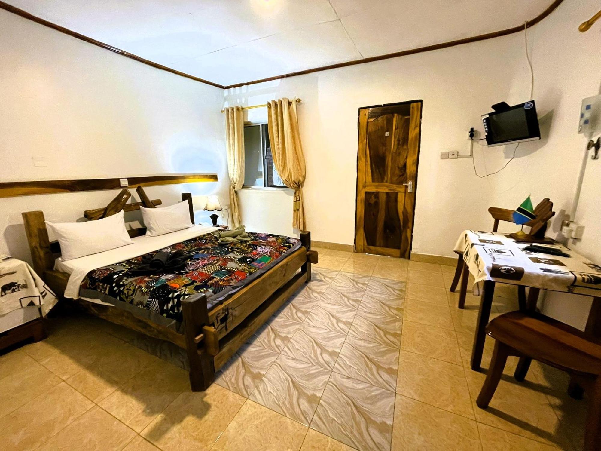 Home Feeling Neneu Lodge Moshi Exterior foto