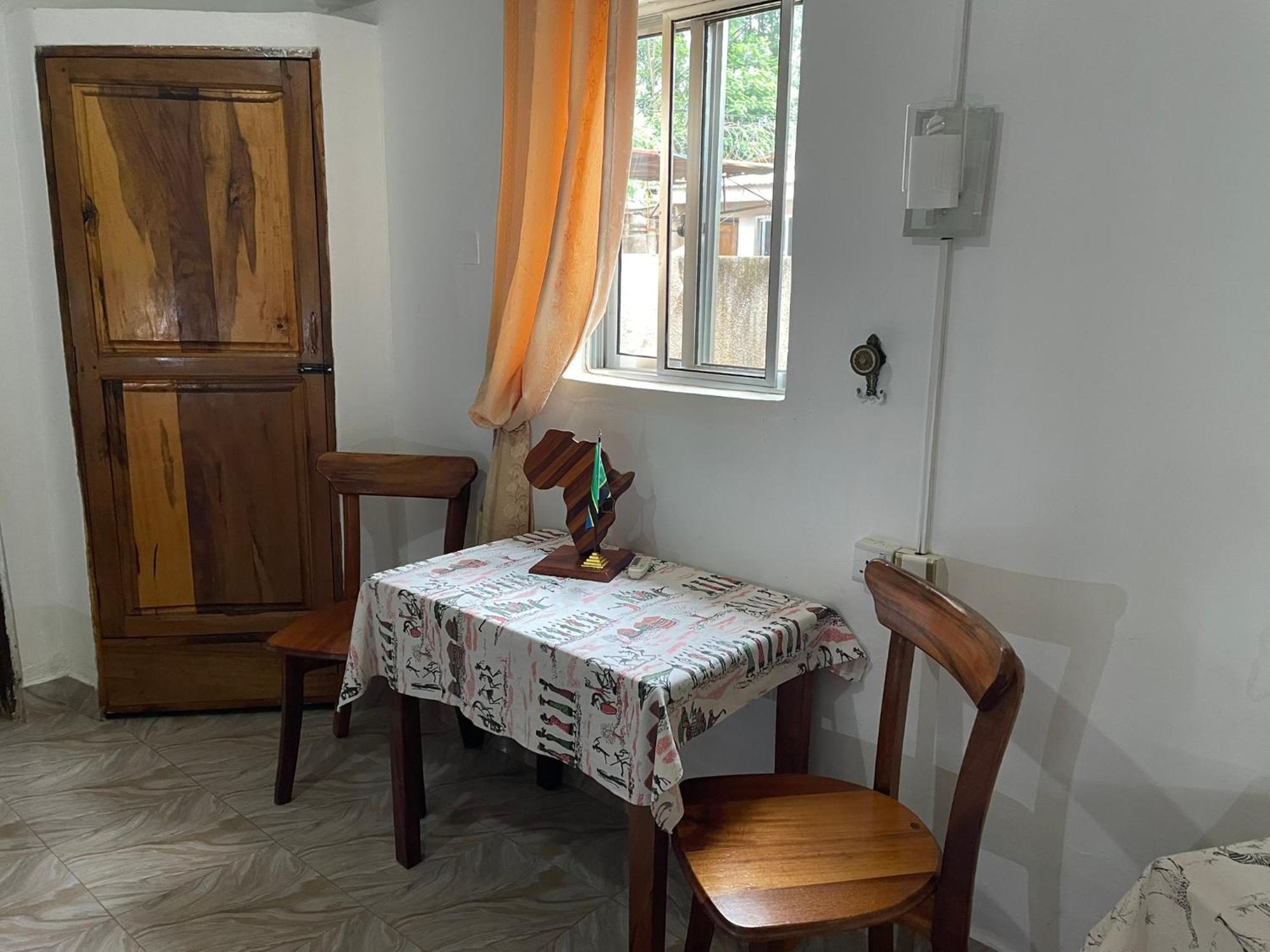 Home Feeling Neneu Lodge Moshi Exterior foto